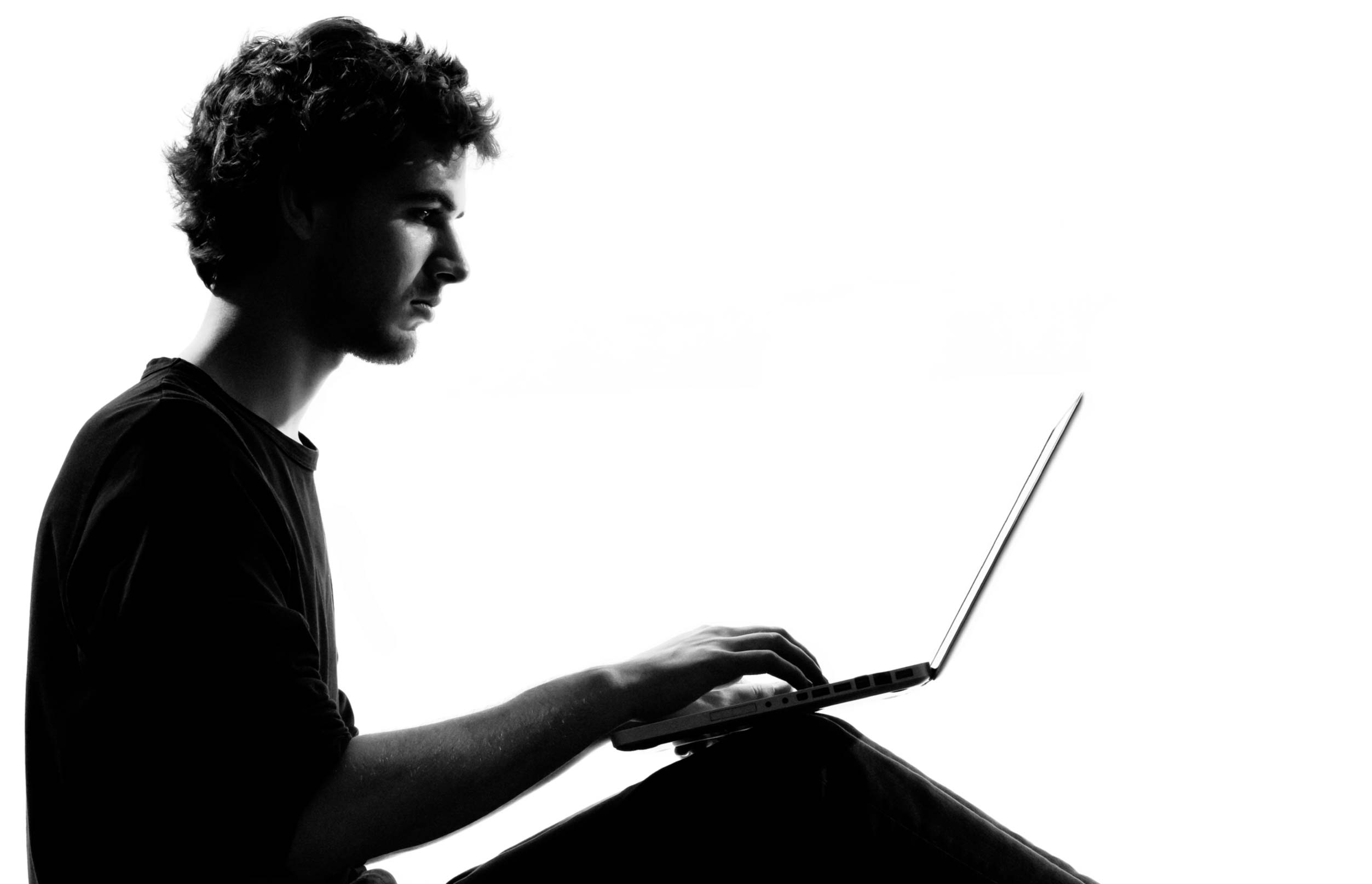 physiotherapy solutions - image of a man on Laptop